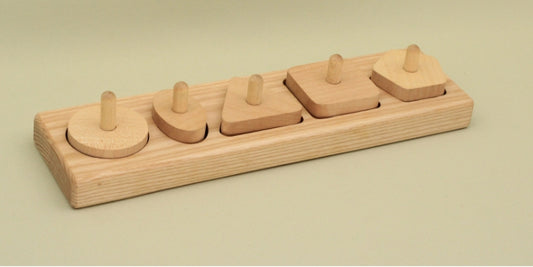 A wooden toy featuring four colorful pieces neatly arranged in a holder, designed for imaginative play and learning.